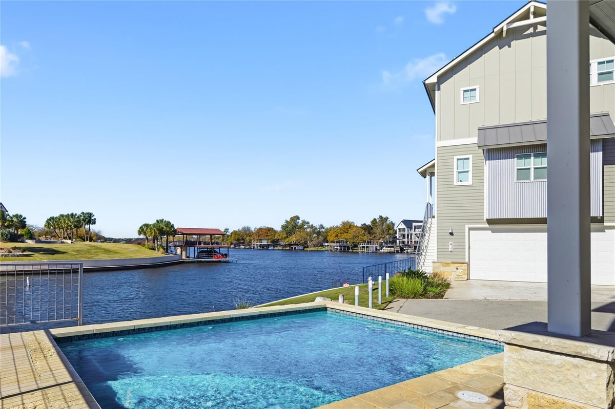 View 321 Island Cir in Clearwater Landing 321 Island Cir - property photo 1 - Luxury home in Clearwater Landing, Kingsland, TX