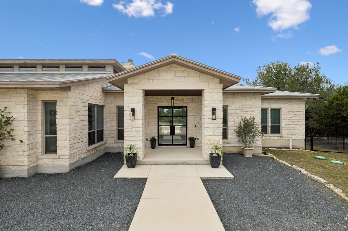 View 3214 Comal Springs in MOUNTAIN SPRINGS RANCH 3214 Comal Springs - front exterior - Luxury home in MOUNTAIN SPRINGS RANCH, Canyon Lake, TX
