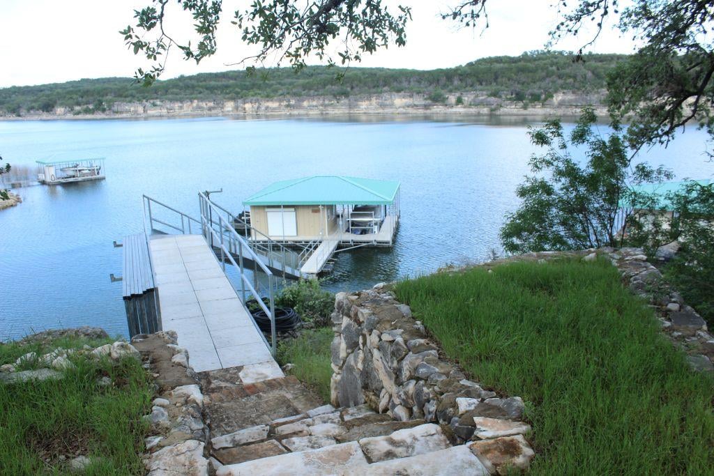 Primary bedroom at 3217 Brasada Ln - Chimney Oaks at Lake Travis, Marble Falls, TX
