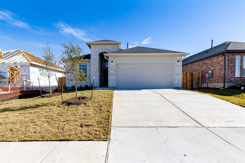 View 325 Diamondleaf Dr in Sunfield Ph Five Sec Three 325 Diamondleaf Dr - property photo 1 - Luxury home in Sunfield Ph Five Sec Three, Buda, TX