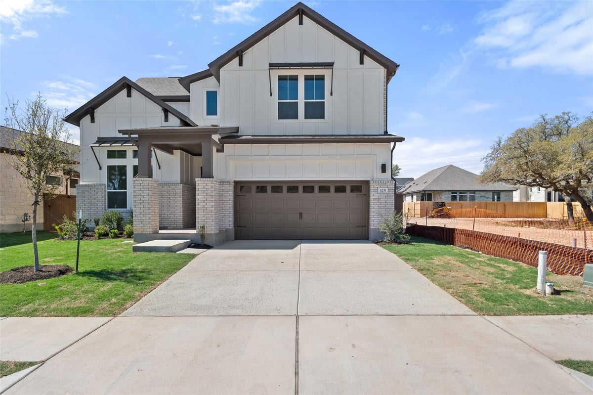 View 325 San Saba DR in Persimmon 325 San Saba DR - front exterior - Luxury home in Persimmon, Buda, TX
