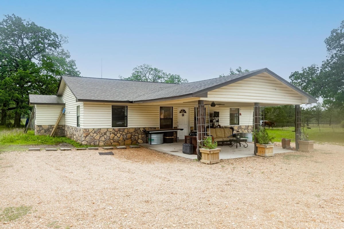View 326 Zapalac Rd in Barton, William 326 Zapalac Rd - front exterior - Luxury home in Barton, William, Smithville, TX