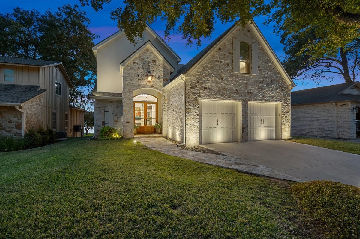 View 327 Meadowlakes DR in Meadowlakes 327 Meadowlakes DR - front exterior - Luxury home in Meadowlakes, Meadowlakes, TX