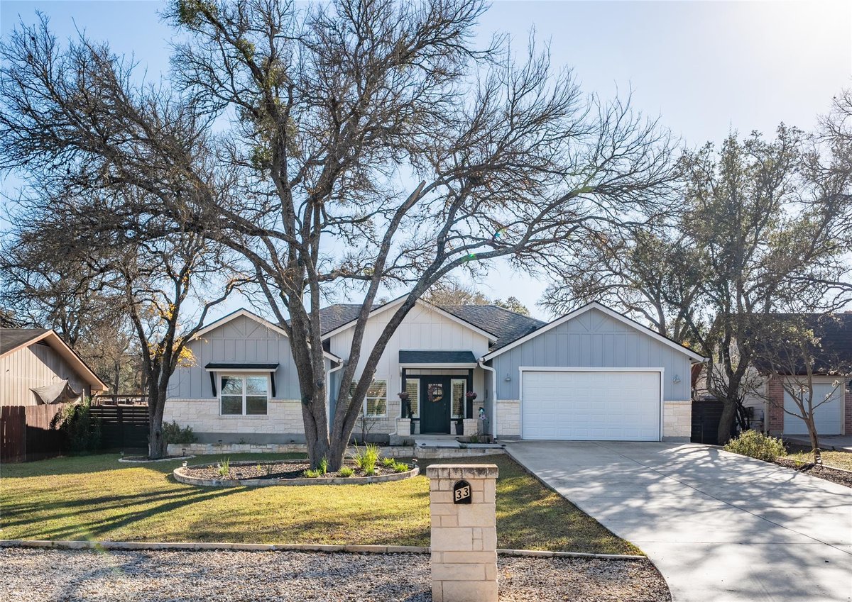 View 33 Deer Ridge Rd in Woodcreek Sec 9-A 33 Deer Ridge Rd - property photo 1 - Luxury home in Woodcreek Sec 9-A, Wimberley, TX