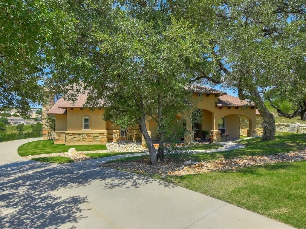 View 3307 Crystal Falls PKWY in Grand Mesa 04 At Crystal Falls 3307 Crystal Falls PKWY - front exterior - Luxury home in Grand Mesa 04 At Crystal Falls, Leander, TX