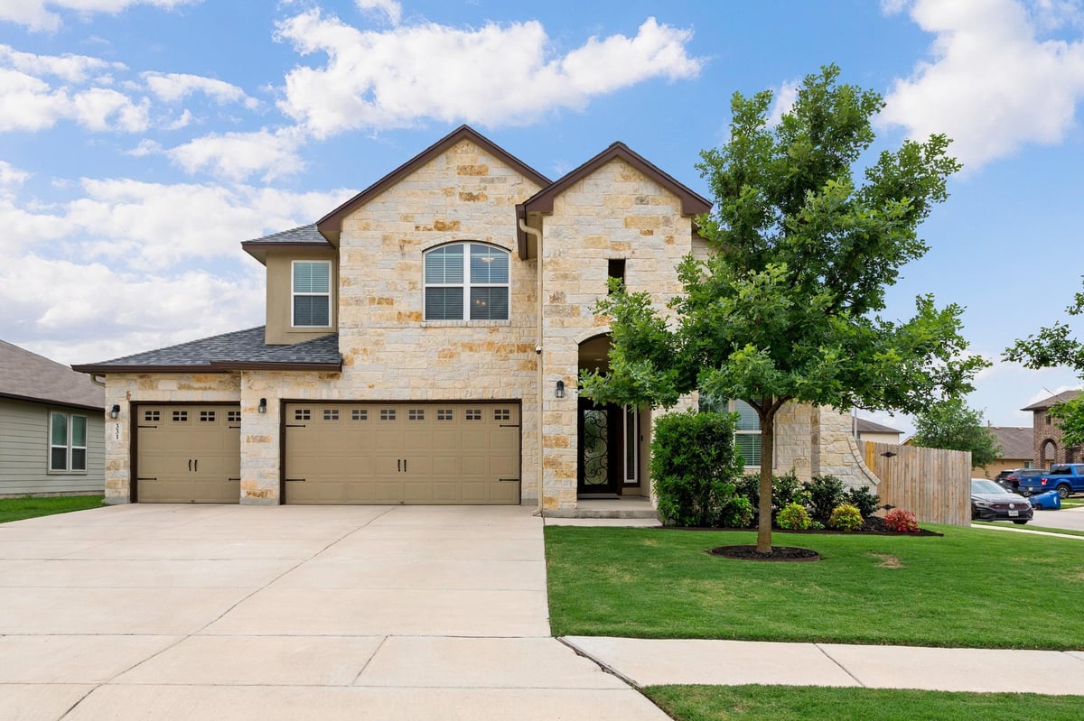 View 331 Limestone Crk in Oak Creek 331 Limestone Crk - front exterior - Luxury home in Oak Creek, New Braunfels, TX