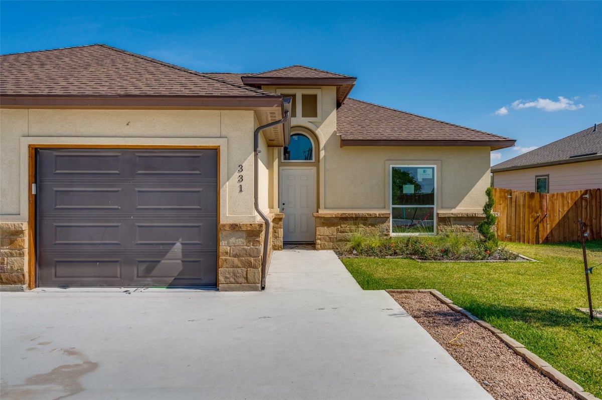 View 331 Navarro Way Unit #26B in Navarro Crossing 331 Navarro Way Unit #26B - front exterior - Luxury home in Navarro Crossing, Seguin, TX