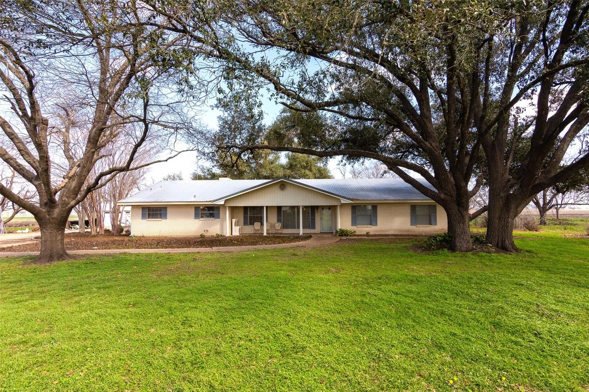 View 3310 N Main St 3310 N Main St - front exterior with 3310 N Main St in Taylor - Luxury home in Taylor, TX
