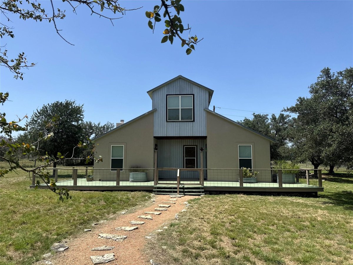 View 332 Turkey Dr RD in Pedernales Place 332 Turkey Dr RD - front exterior - Luxury home in Pedernales Place, Dripping Springs, TX