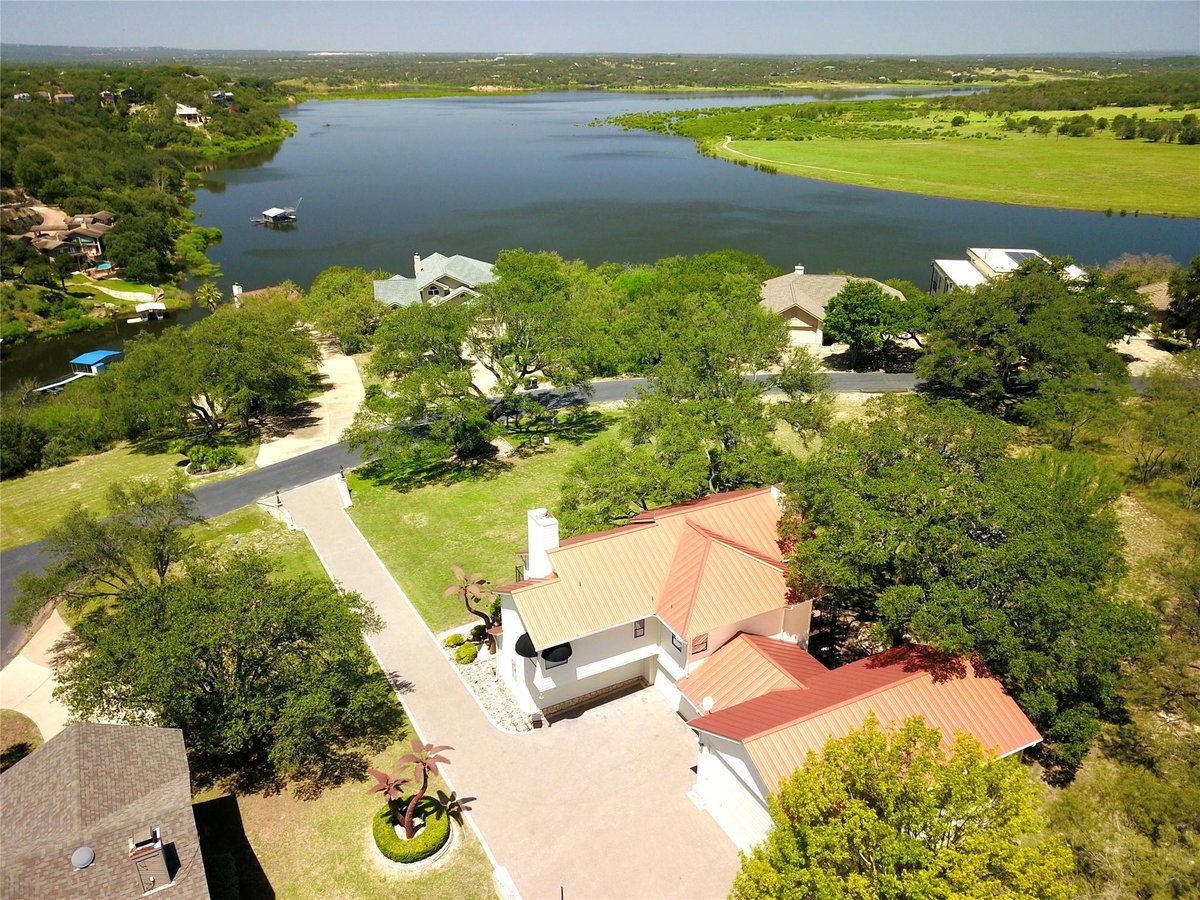 View 333 Quail Run Ct in Ridge Harbor 333 Quail Run Ct - property photo 1 - Luxury home in Ridge Harbor, Spicewood, TX
