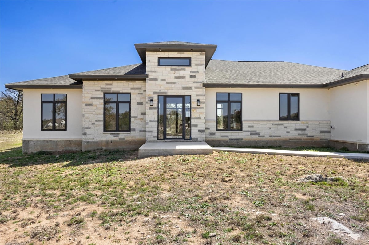 View 333 Spicewood Trails Dr in Spicewood Trails 333 Spicewood Trails Dr - front exterior - Luxury home in Spicewood Trails, Spicewood, TX