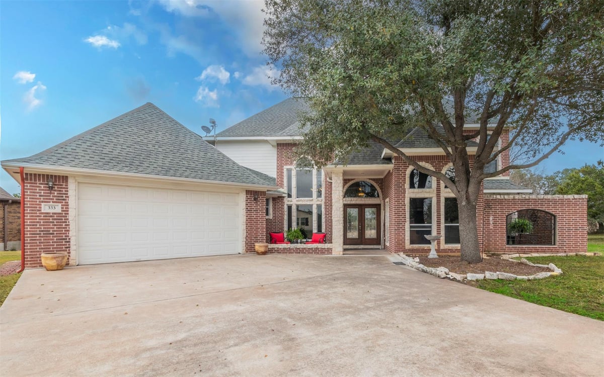 View 333 Wesley RDG in Point At Ridge Harbor 333 Wesley RDG - property photo 1 - Luxury home in Point At Ridge Harbor, Spicewood, TX