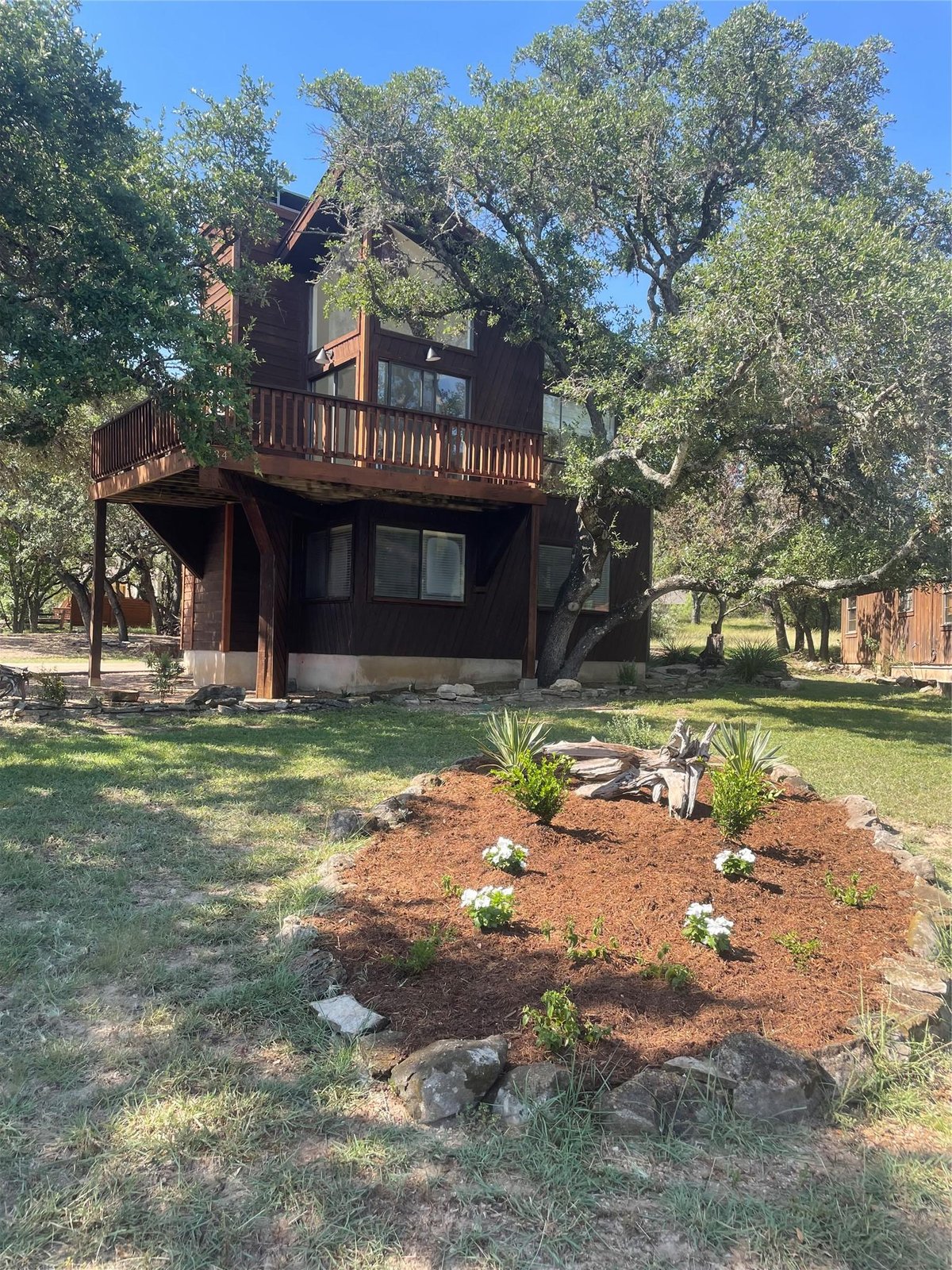 View 334 Coventry RD in Windermere Oaks 334 Coventry RD - front exterior - Luxury home in Windermere Oaks, Spicewood, TX
