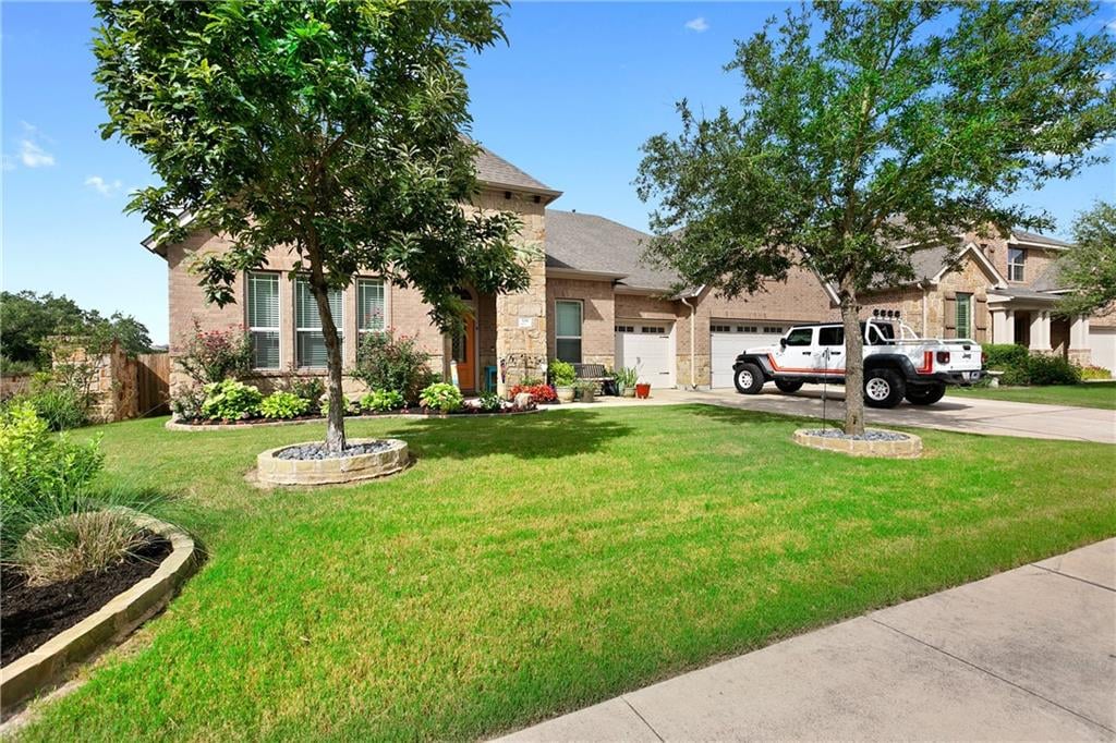 View 338 Merion Dr in Belterra Ph 4 Sec 13 338 Merion Dr - front exterior - Luxury home in Belterra Ph 4 Sec 13, Austin, TX