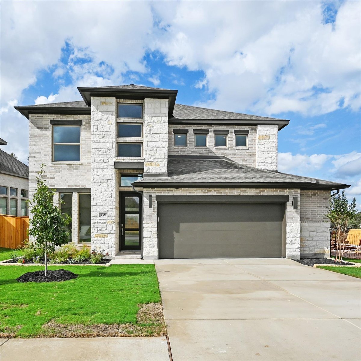 View 338 Prickly Poppy Loop in 6 CREEKS 338 Prickly Poppy Loop - front exterior - Luxury home in 6 CREEKS, Kyle, TX