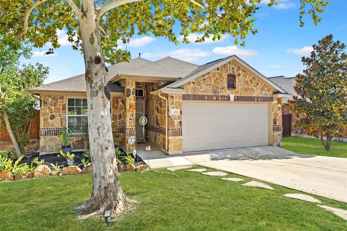 View 339 Strawberry Blonde Dr in Sunfield Ph One Sec Two 339 Strawberry Blonde Dr - front exterior - Luxury home in Sunfield Ph One Sec Two, Buda, TX
