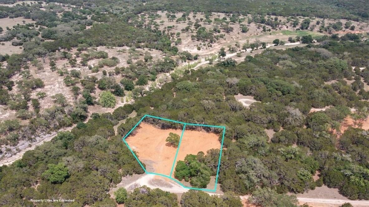 View 34 & 36 Stardust Cir in Woodcreek Sec 19 34 & 36 Stardust Cir - front exterior - Luxury lot in Woodcreek Sec 19, Wimberley, TX