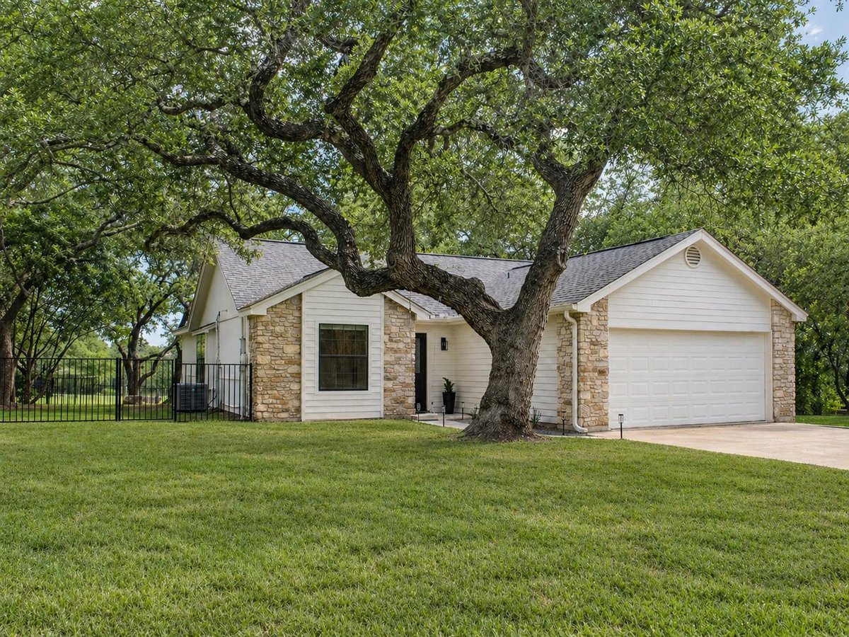 View 34 Pebblebrook Ln in Woodcreek Sec 2 34 Pebblebrook Ln - front exterior - Luxury home in Woodcreek Sec 2, Wimberley, TX