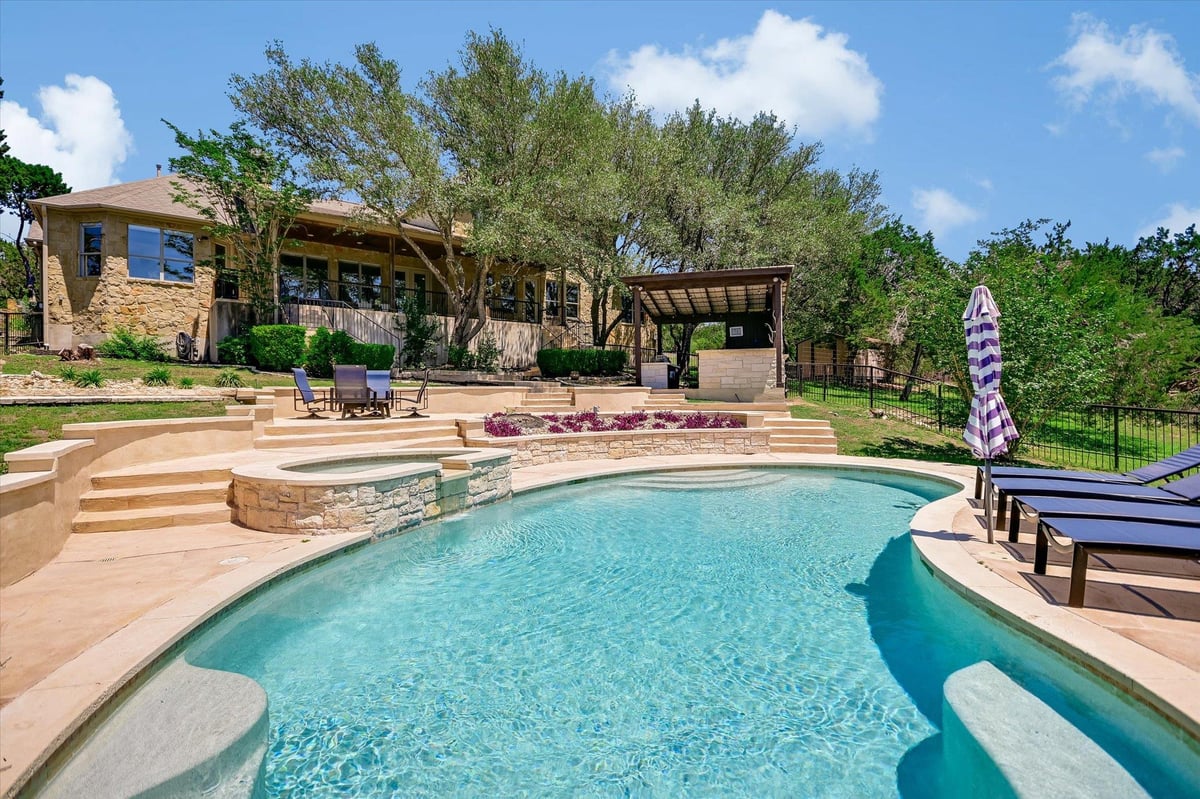 View 3410 Pawnee Pass S in Roughin Hills 3410 Pawnee Pass S - front exterior - Luxury home in Roughin Hills, Austin, TX