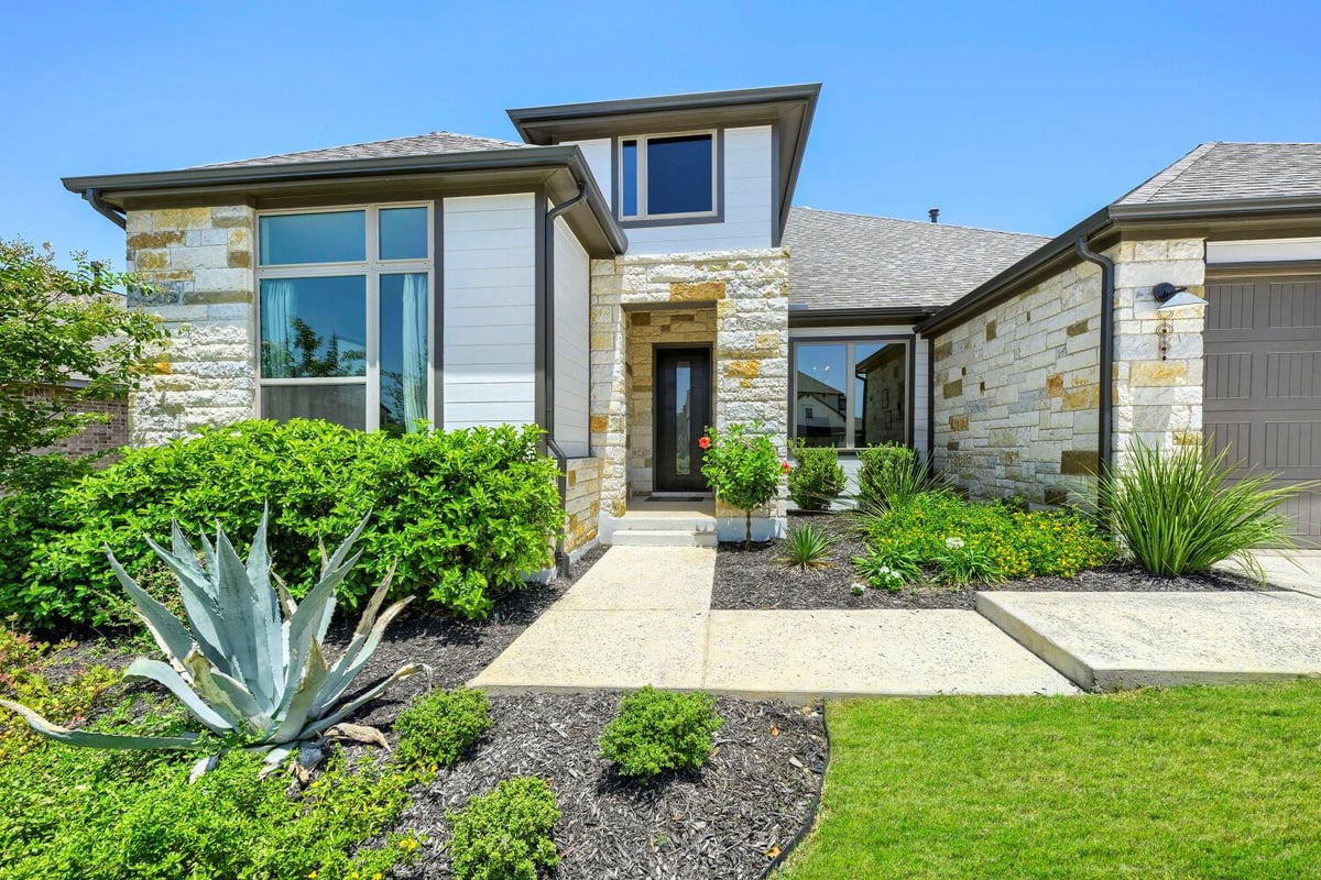 View 342 Bridge Water LOOP in Caliterra Ph Four Sec 12 342 Bridge Water LOOP - front exterior - Luxury home in Caliterra Ph Four Sec 12, Dripping Springs, TX