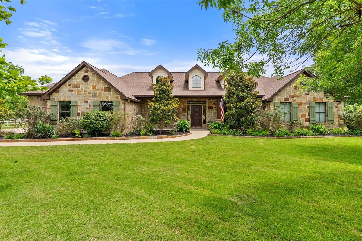 View 343 Colorado DR in River Crossing 343 Colorado DR - front exterior - Luxury home in River Crossing, Cedar Creek, TX
