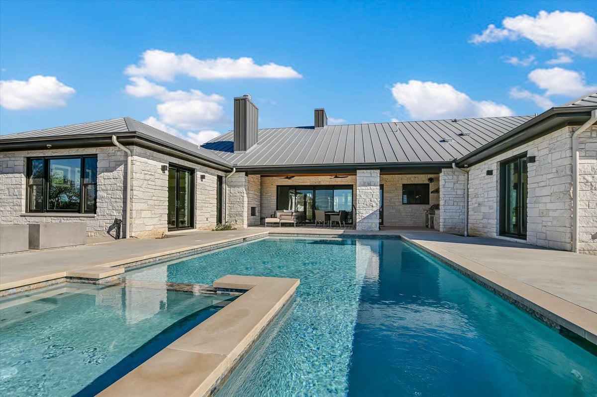View 343 Pug Rippy Rd in Creek Road Ranch Sec 1 343 Pug Rippy Rd - front exterior - Luxury home in Creek Road Ranch Sec 1, Dripping Springs, TX