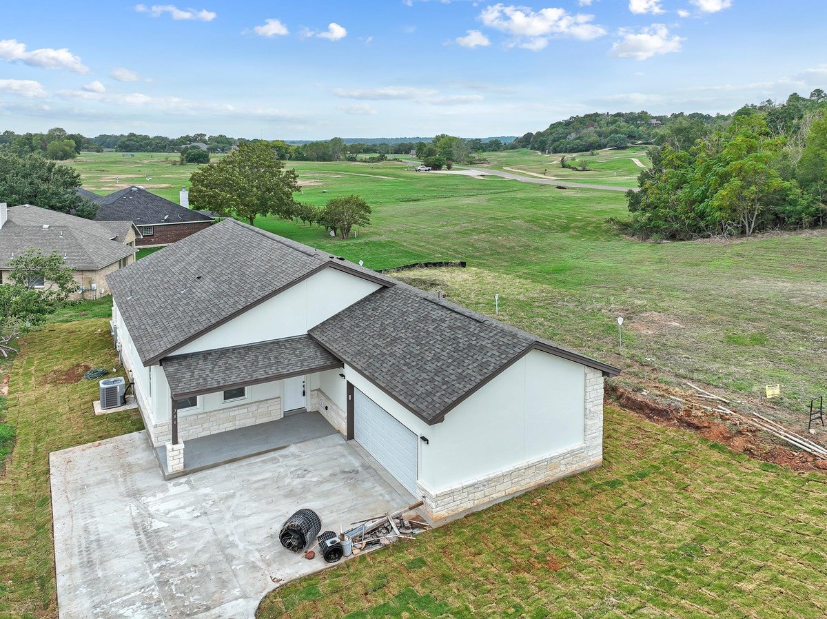 View 344 Colovista PKWY in Colovista Country Club 344 Colovista PKWY - front exterior - Luxury home in Colovista Country Club, Bastrop, TX