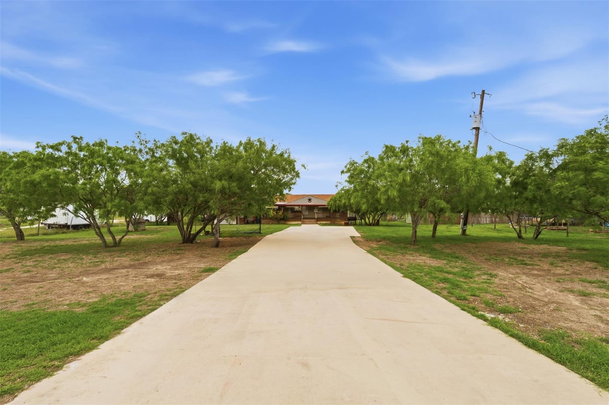 View 345 Morning Mist in Sunrise Meadows 345 Morning Mist - front exterior - Luxury home in Sunrise Meadows, Lockhart, TX