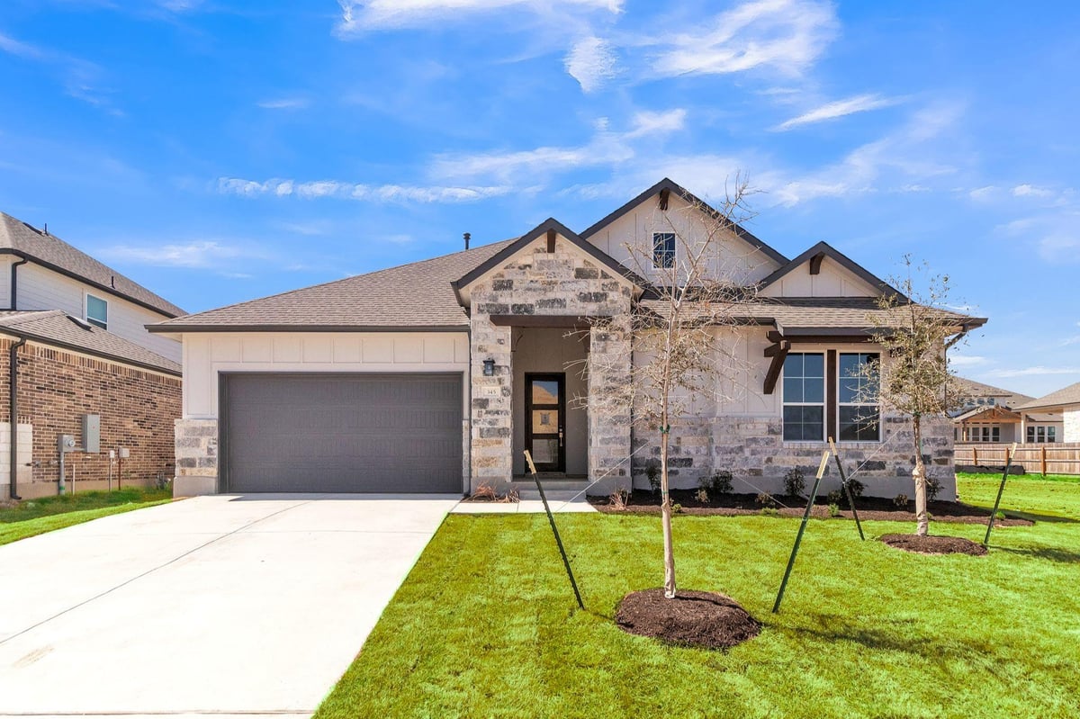 View 345 Olinda Way in Saddleback at Santa Rita Ranch 345 Olinda Way - front exterior - Luxury home in Saddleback at Santa Rita Ranch, Liberty Hill, TX