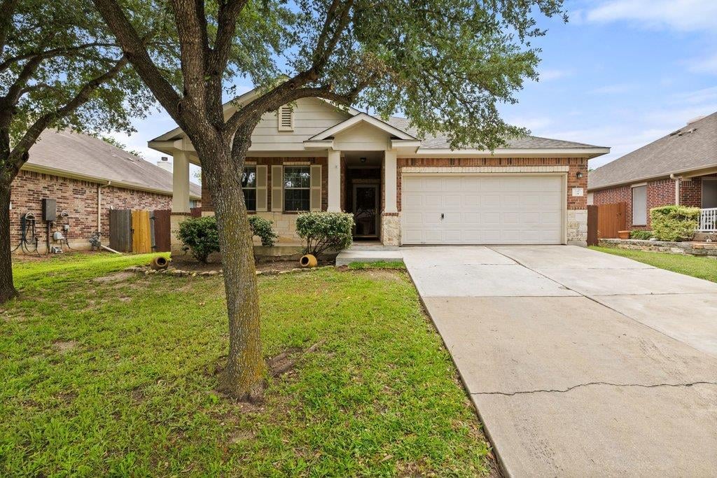 View 347 Spring DR in Four Seasons Farm Sec Ii 347 Spring DR - front exterior - Luxury home in Four Seasons Farm Sec Ii, Kyle, TX