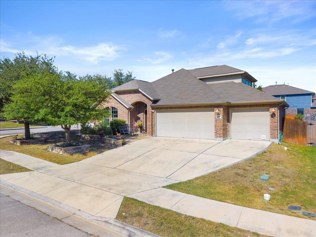 View 349 Razzmatazz Trl in Sunfield Ph One Sec One 349 Razzmatazz Trl - front exterior - Luxury home in Sunfield Ph One Sec One, Buda, TX