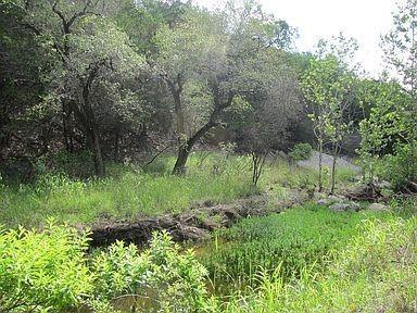 View 350 Bluff RD in N/A 350 Bluff RD - front exterior - Luxury lot in N/A, Spicewood, TX