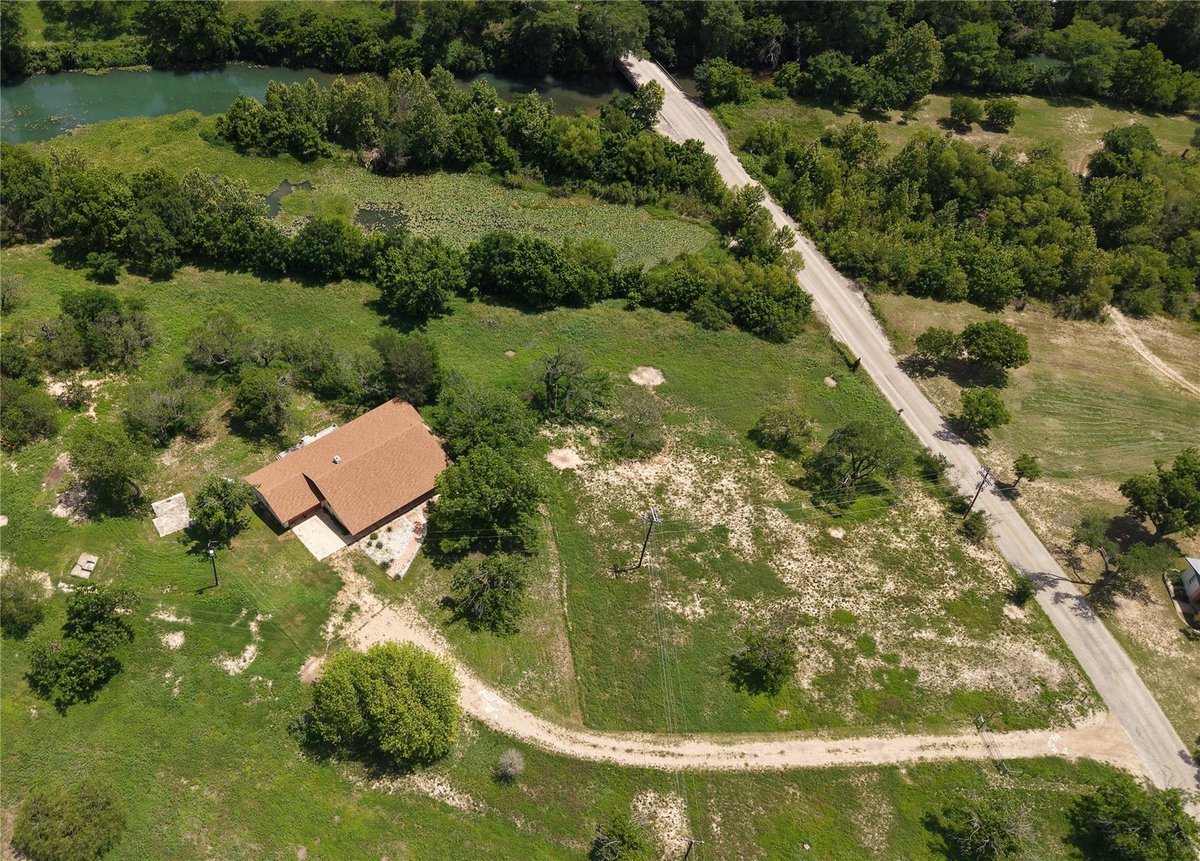 View 3500 Scull RD in B & G FULCHER 3500 Scull RD - property photo 1 - Luxury home in B & G FULCHER, Martindale, TX