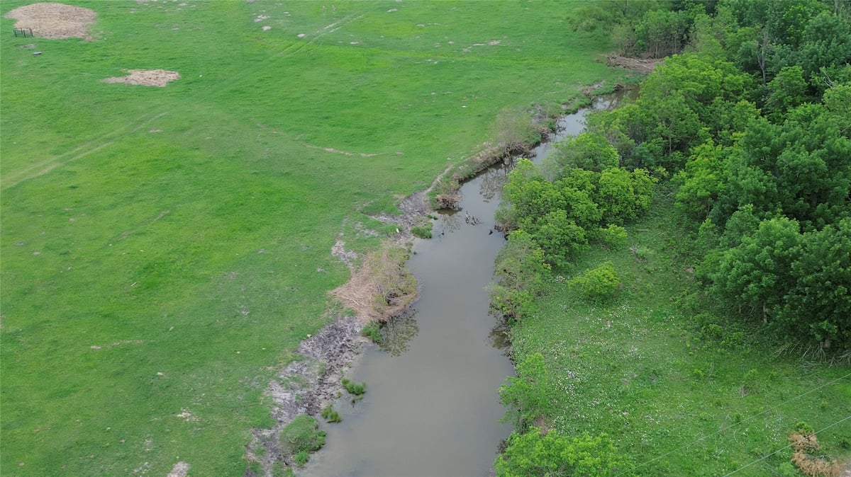 View 3501 County Road 409 in Pharrass 3501 County Road 409 - aerial view with riparian creek frontage - Luxury home in Pharrass, Taylor, TX