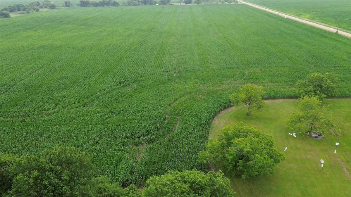 Aerial view with expansive acreage at 3501 County Road 409 - Pharrass, Taylor, TX