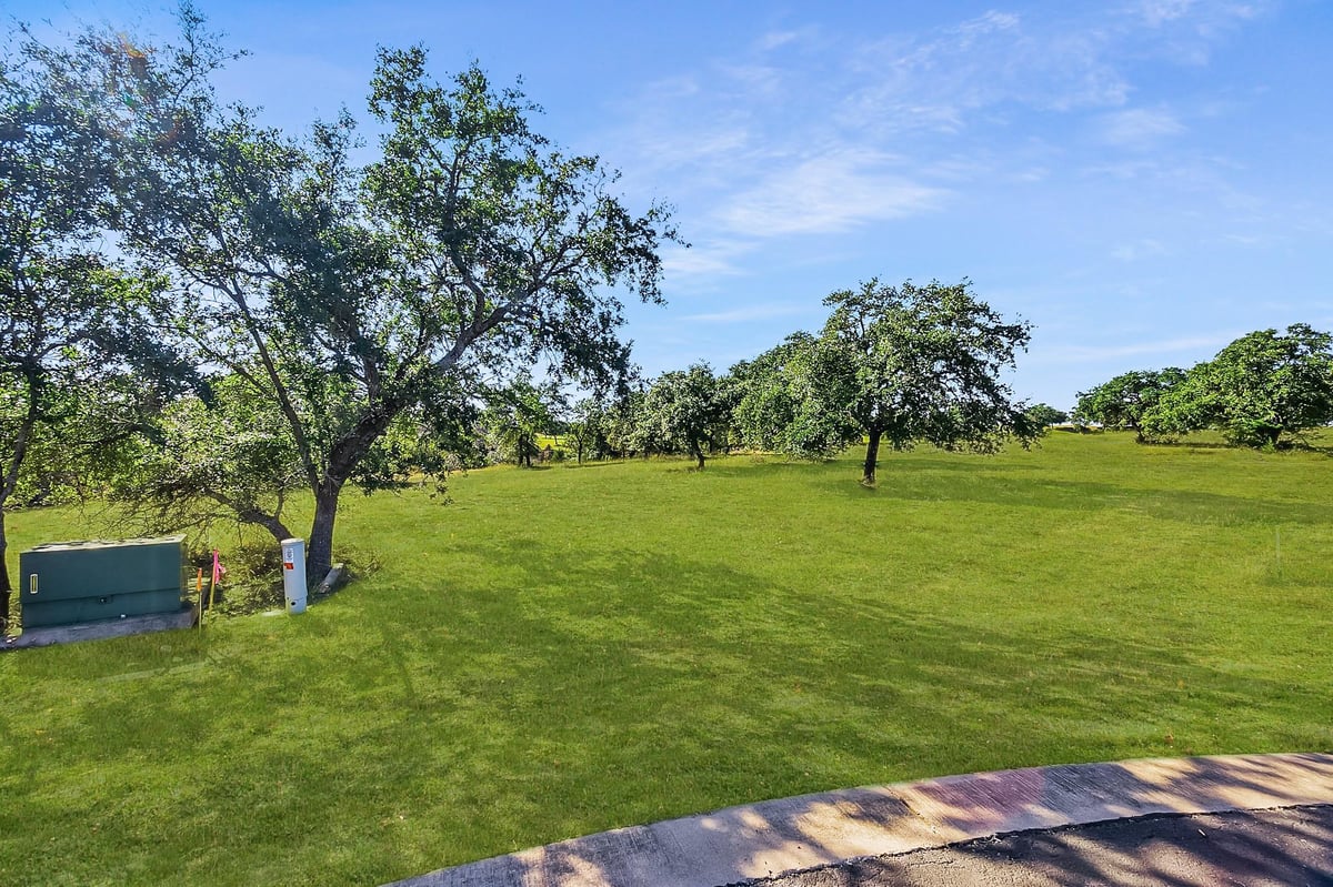 View 3509 Kahala Sunset Dr in Lakecliff On Lake Travis Sec 6 3509 Kahala Sunset Dr - front exterior - Luxury lot in Lakecliff On Lake Travis Sec 6, Spicewood, TX