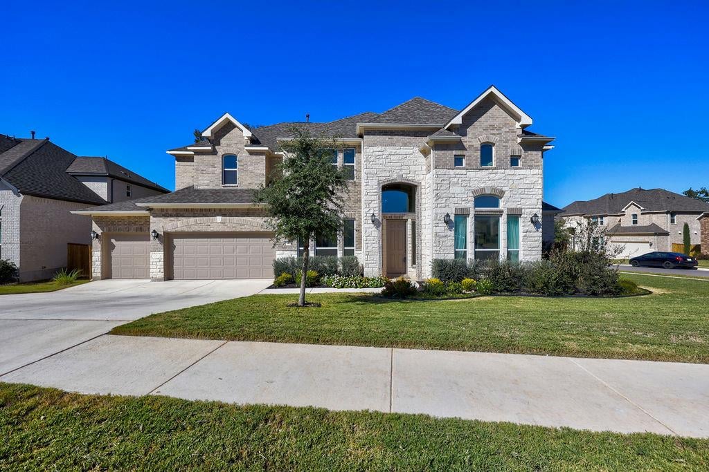 View 351 Pigeon River Rd in 6 Creeks Ph 1 Sec 8A 351 Pigeon River Rd - front exterior - Luxury home in 6 Creeks Ph 1 Sec 8A, Kyle, TX