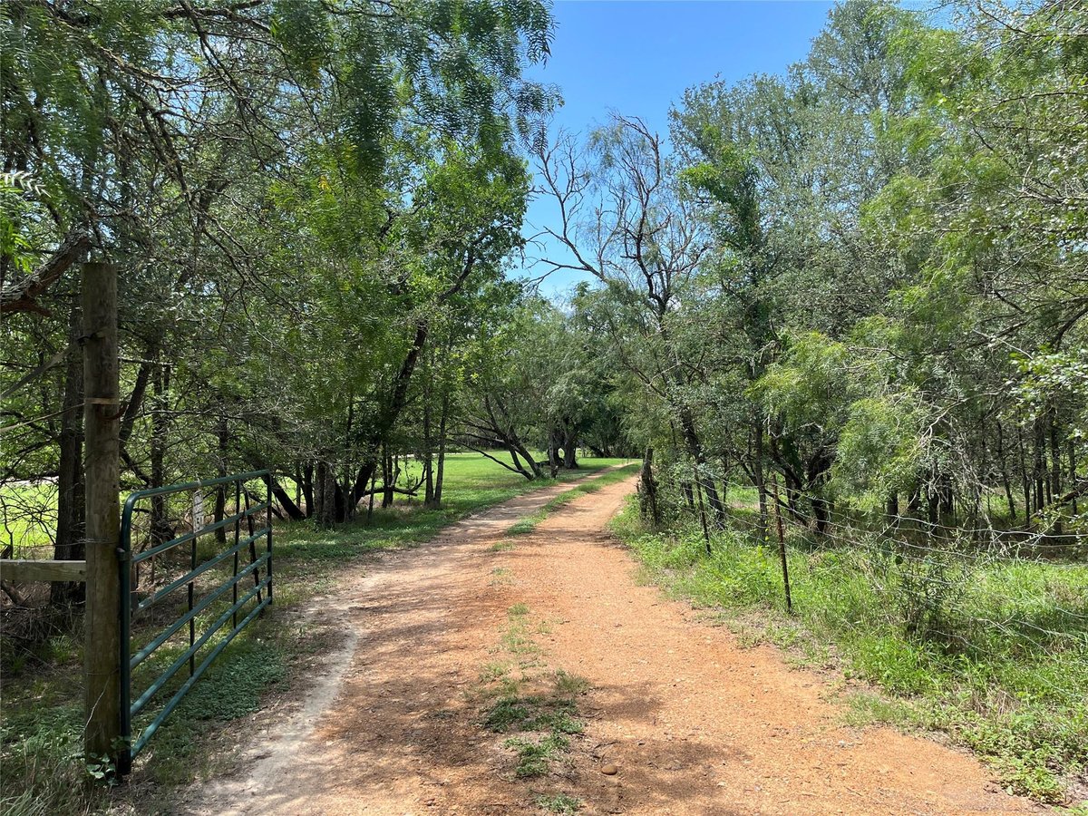 View 354 Lower Red Rock Rd in Cedar Creek Farms 354 Lower Red Rock Rd - property photo 1 - Luxury lot in Cedar Creek Farms, Bastrop, TX