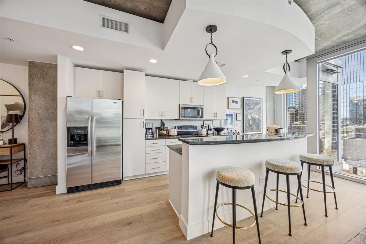 Primary bedroom at 360 Nueces St Unit #1001 - 1 bed 1 bath home