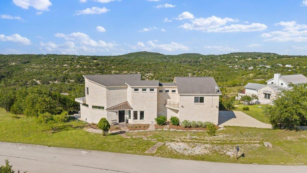 View 360 Stacey Ann CV in Walking W Ranch Ph B 360 Stacey Ann CV - front exterior - Luxury home in Walking W Ranch Ph B, Dripping Springs, TX