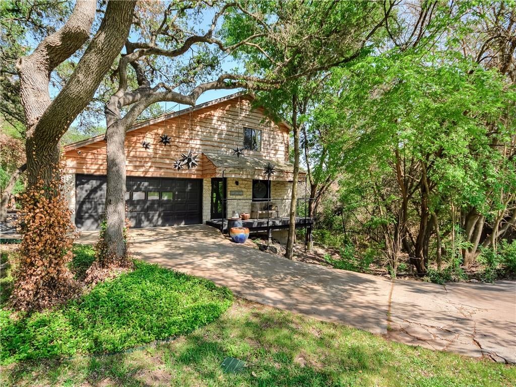 View 3604 Pinnacle RD in Woodhaven 3604 Pinnacle RD - front exterior - Luxury home in Woodhaven, Austin, TX