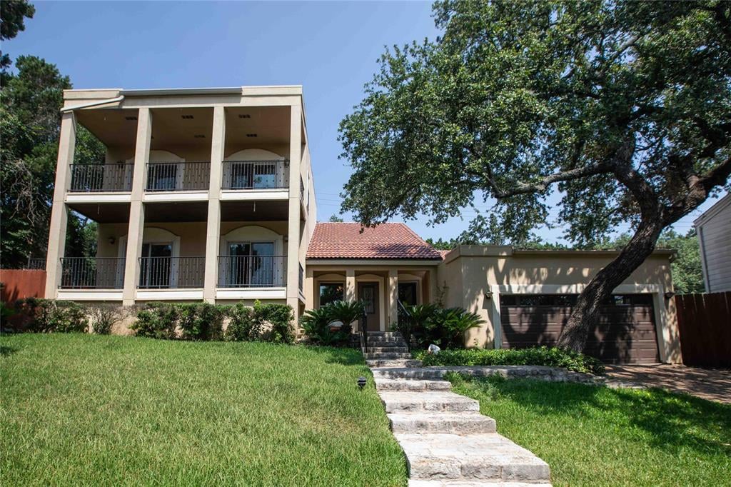 View 3613 Peregrine Falcon DR in Woodhaven 3613 Peregrine Falcon DR - front exterior - Luxury home in Woodhaven, Austin, TX