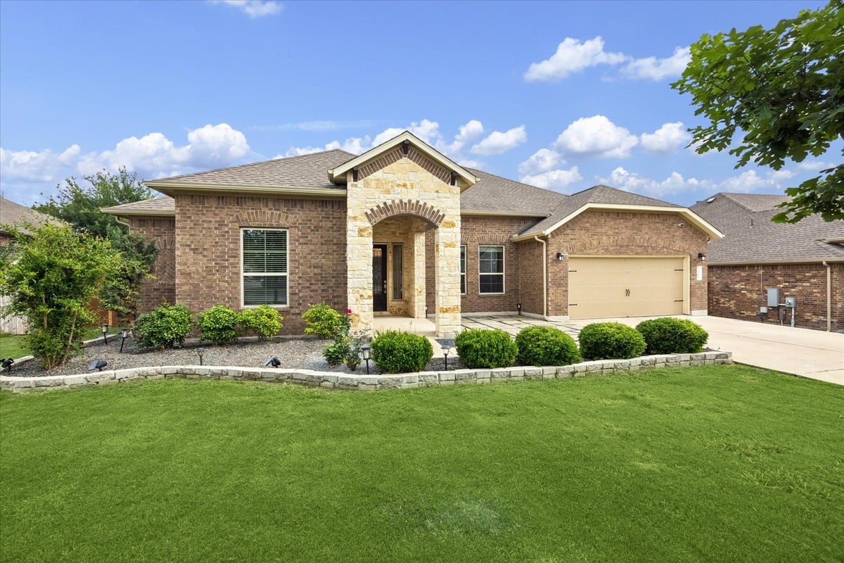 View 365 Arapaho Dr in Cypress Forest Ph Two 365 Arapaho Dr - front exterior - Luxury home in Cypress Forest Ph Two, Kyle, TX