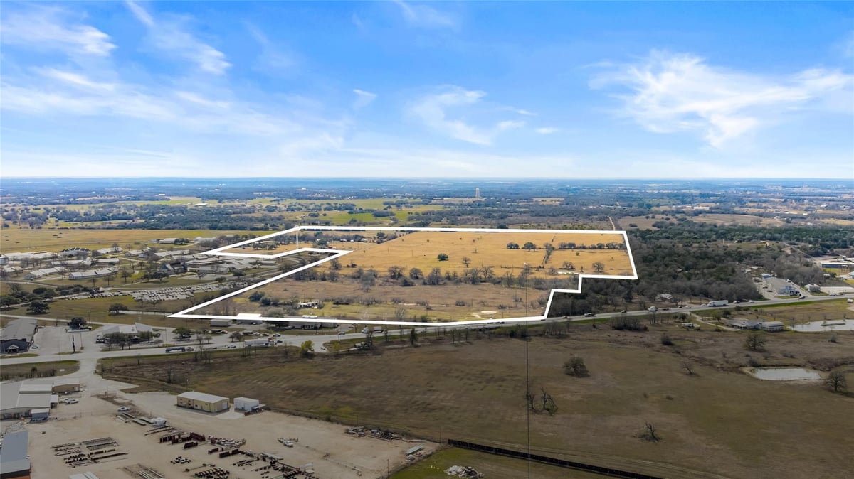 View 3650 E Austin St in Chandler Sub 3650 E Austin St - aerial view with 3650 E Austin St in Giddings - Luxury home in Chandler Sub, Giddings, TX