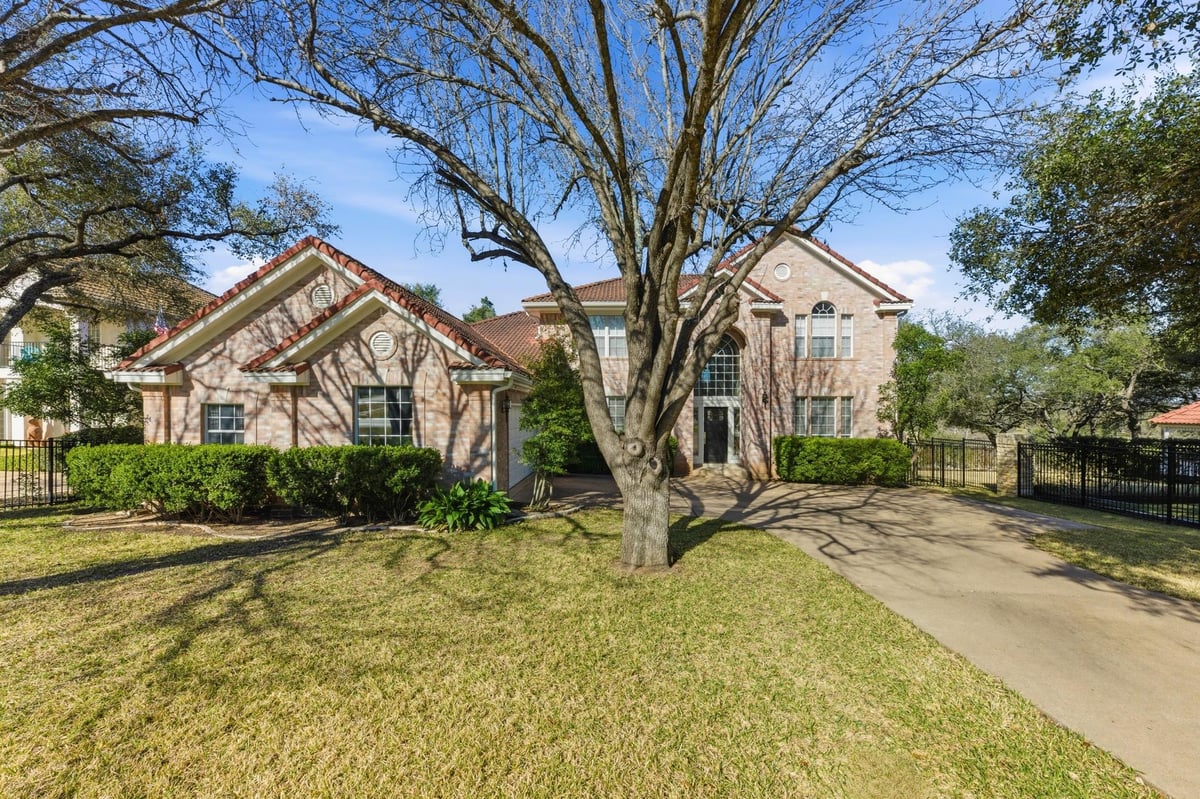 View 37 Waterfall Dr in Hills Lakeway Ph 05 Amd 37 Waterfall Dr - front exterior - Luxury home in Hills Lakeway Ph 05 Amd, The Hills, TX