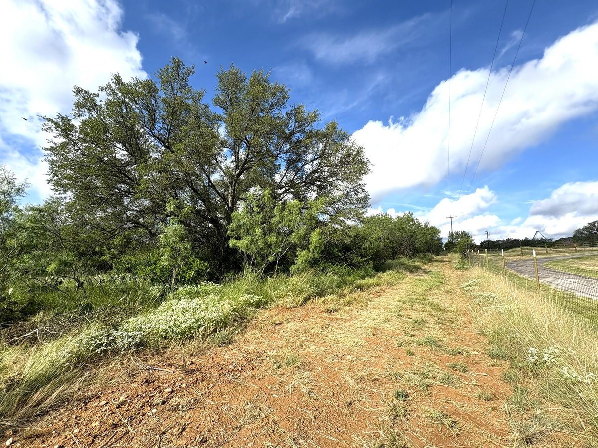View 374 Sandy Mountain Dr in 13133 374 Sandy Mountain Dr - front exterior - Luxury lot in 13133, Sunrise Beach, TX