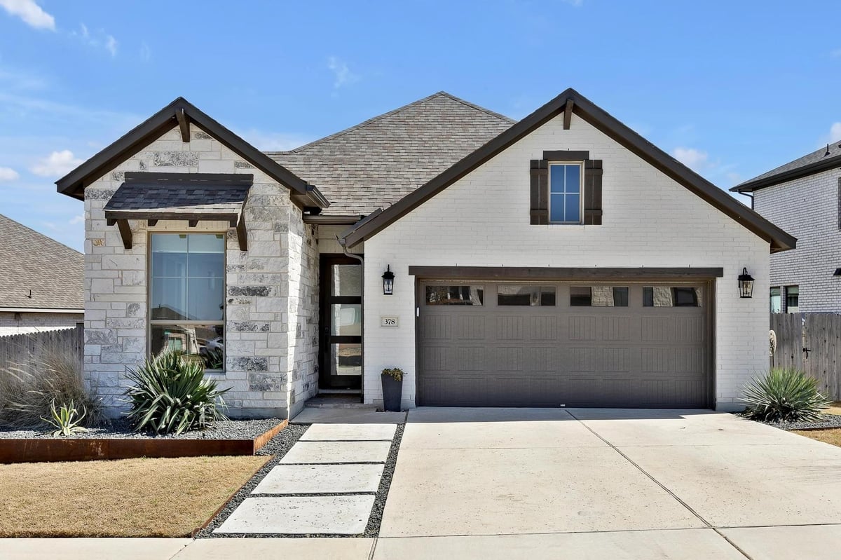 View 378 Carpenter Hill Dr in Carpenter Hill Sec 3 378 Carpenter Hill Dr - front exterior - Luxury home in Carpenter Hill Sec 3, Buda, TX