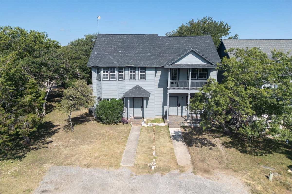 View 38 Deer Ridge Rd in Woodcreek Sec 9A 38 Deer Ridge Rd - property photo 1 - Luxury home in Woodcreek Sec 9A, Wimberley, TX