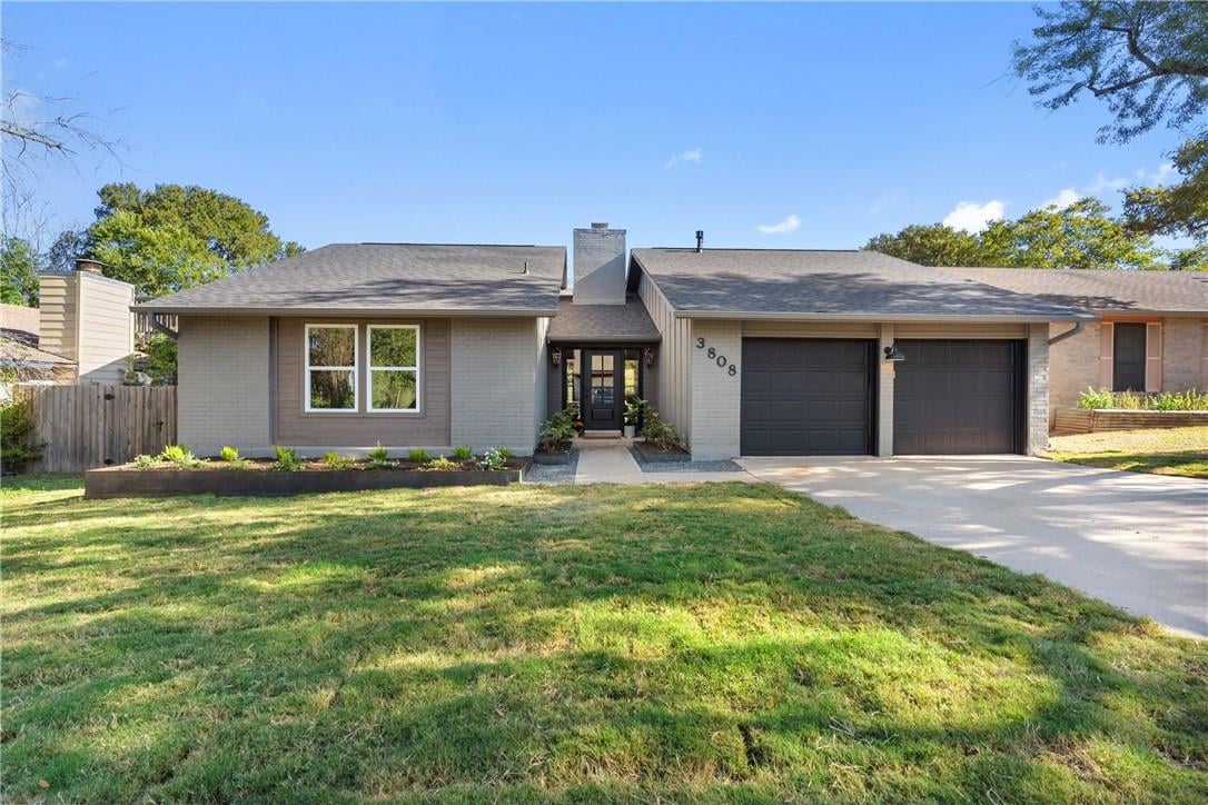 View 3808 Leafield DR in Woodstone Village 3808 Leafield DR - front exterior - Luxury home in Woodstone Village, Austin, TX