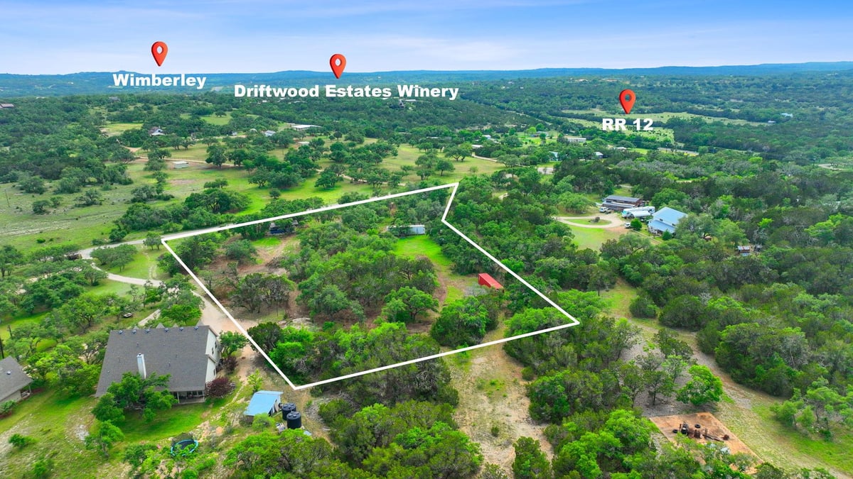 View 385 Country Ln in Enoch Acres 385 Country Ln - front exterior - Luxury lot in Enoch Acres, Dripping Springs, TX